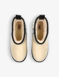 Ugg Classic Clear Mini II PVC And Shearling Boots 6-10 Years 7 Ugg Classic Clear Mini II PVC And Shearling Boots 6-10 Years -Ugg R03955875 BEIGECOMB ALT01
